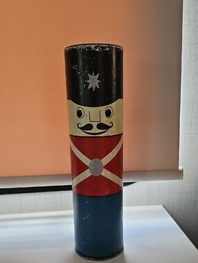 Decorative Nutcracker Tin Cylinder - Black, Red, Blue